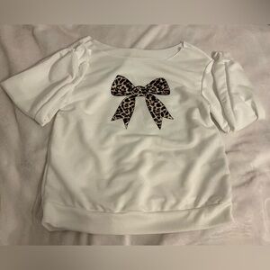 Off shoulder crew neck with Cheetah Print bow